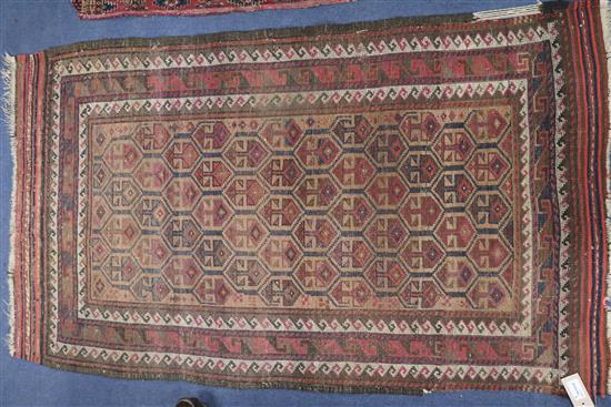 A Shiraz rug, a Bokhara saddlecloth and another rug (wear)